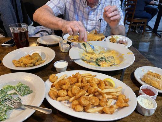 Seafood fondue, popcorn shrimp, and fried pickles