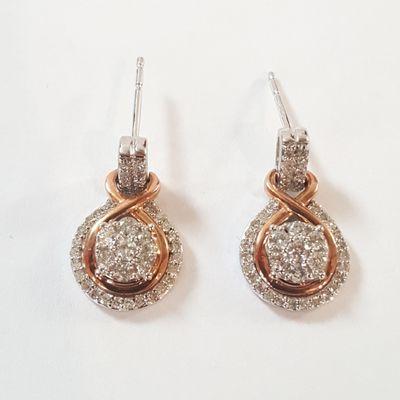 White and Rose Gold diamond earrings 0.50ctw half a carat.