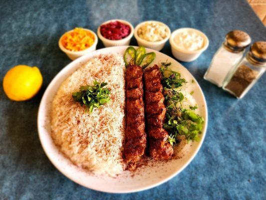 Lule kabob with rice and side salads