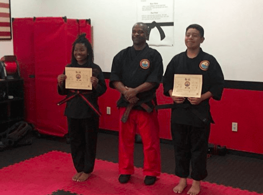 Congratulations to our new Black Belts (David and Zoey)