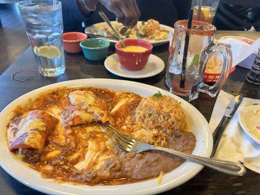 Tex Mex Enchiladas with Beef!!!Chasing it down with a Strawberry On the Rocks Rita!!!