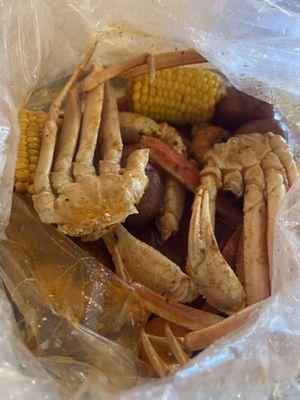 1lb snow crab legs 1/2 lb headless shrimp with corn and potatoes.