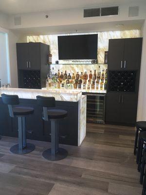 Lit Onyx bar complete. A backlit bar or island makes an incredible conversation piece and addition to your home.