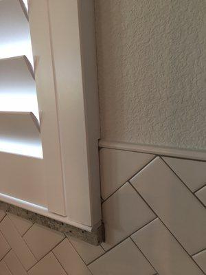 Detail work is what we do, shutters installed over a custom kitchen back splash.