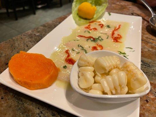 Tiradito - Sashimi Style sliced fish & fresh lime juice ( you can tell by the peppers it is a bit spicy but that's our preference)