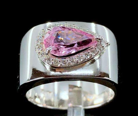 Padparadscha sapphire and diamond ring