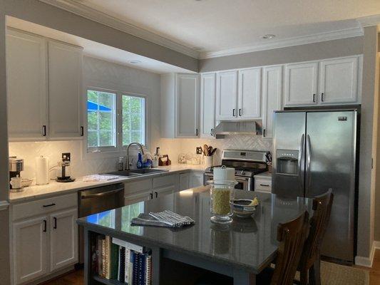 Backsplash all around window and under counter lights