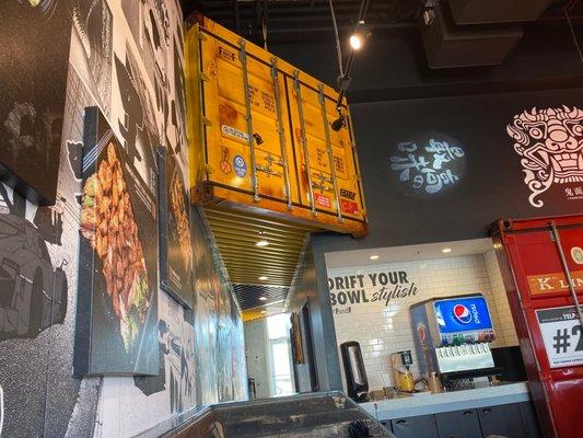 interior - eclectic decor! shipping containers, tailgates and chandeliers!