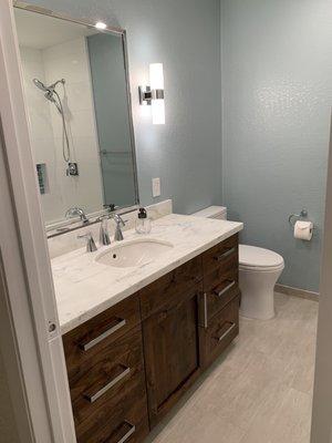 Knotty alder guest bath vanity (we're still unpacking so excuse the lack of decor on our part)