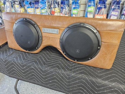 Custom fiberglass sub box wrapped in Leather for 2 JL Audio 8" Sub-Woofers.