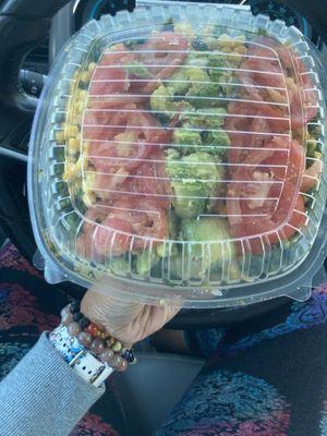 Six item plate with mixed kale, corn and blackeye pea hummus