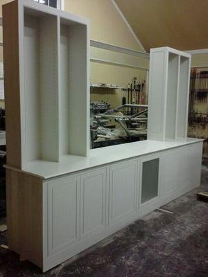 built-in unit before installation between two walls and floor to ceiling