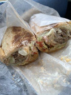 Cheesesteak sub with everything (lettuce, tomato, Mayo, fried onion and hot peppers.