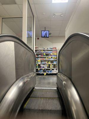 This CVS features an escalator  to get to the second floor