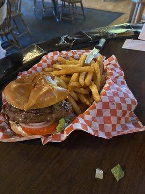 He took a bite haha... green peppers and goat cheese burger? He can't remember. He liked it!