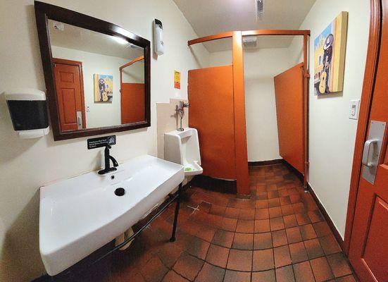 The men's restroom. Panoramic photo caused a curved floor.