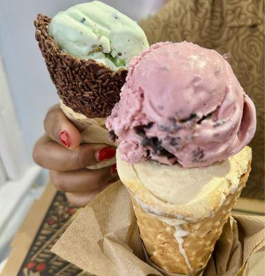 Black cherry, and dulce de lèche regular cone, and pistachio on chocolate sprinkle cone