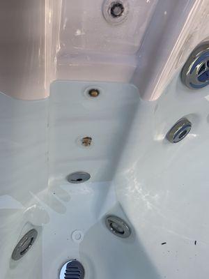 the two light covers were not attached correctly and are leaking, causing damage on the interior of the hot tub.