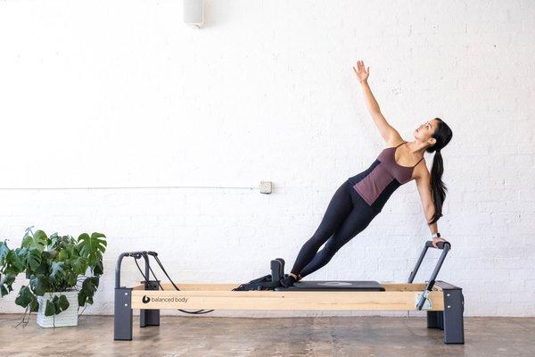 Instructor demonstrating side plank