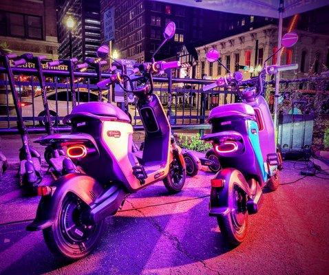 Fun and colorful mopeds ready to be taken out!