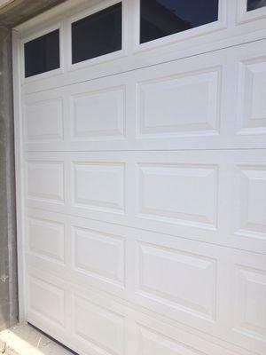 A garage door 9x8 short panel with polarized glass different colors are available.