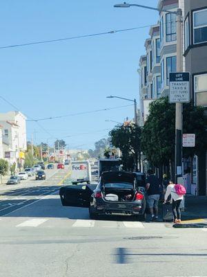 Blocking traffic with his door