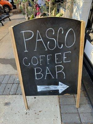 Sign out in front of the store - coffee bar is in the back of the store