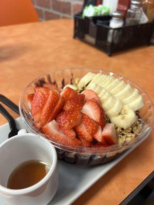 Custom açaí bowl with strawberry, banana and honey