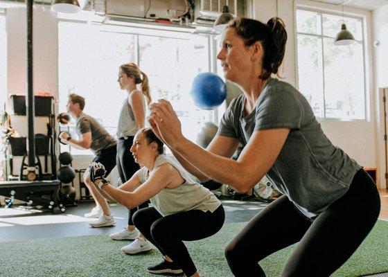 More personal attention. With groups capped at four people, instructors have time to give individualized instruction and form correction.