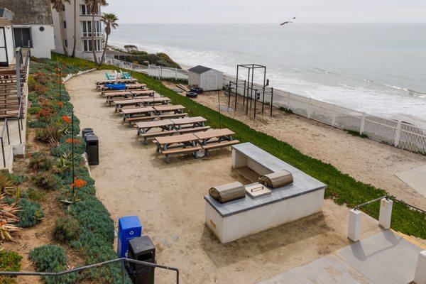 The Academy beachfront property provides outdoor grills, picnic tables, a firepit, an outdoor gym and direct access to the beach.