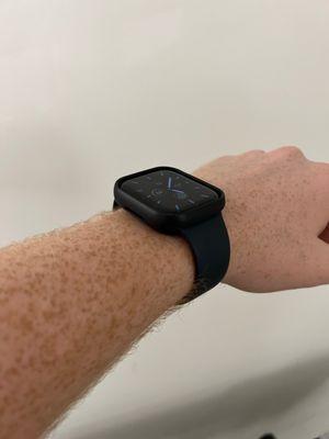 Screen protector and bumper for Apple Watch, applied by staff member