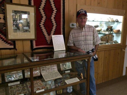 My dad with pieces of his collection that he donated to Rankin.