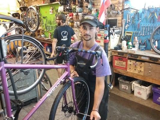 Jean Carlos, a graduate of our youth programs, working in Ciclo Urbano as a Lead Mechanic