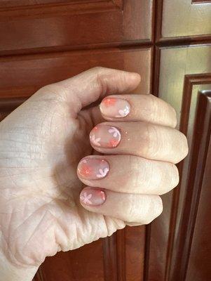 gel manicure with floral design