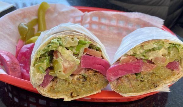 Pita pocket sandwich with falafel and baba ghanoush