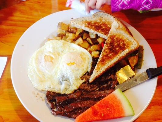 Steak and eggs... It's good .. Would tasted much better if the lady was nicer!