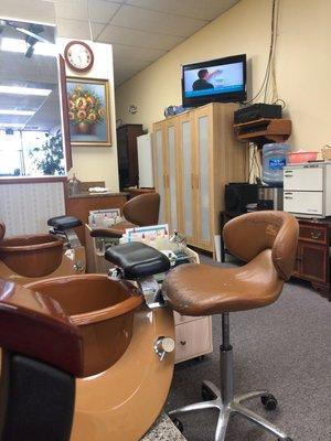 Near back of salon & the Pedicure Massage chairs