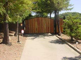 Wrought Iron swing gate with Gate operator and Pedestrian gate. By R&S