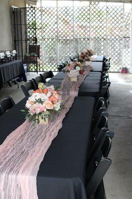 Setup arrangement with flower centerpieces