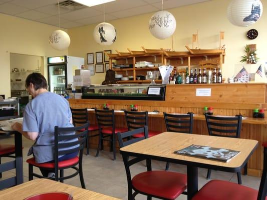 Inside the restaurant.  Sushi bar for 8 people and about 10 other tables.