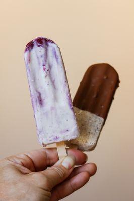 Blueberry Cheesecake & Cookies n' Cream w/ half dip in milk chocolate