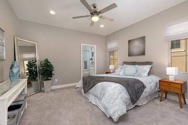 A great example of bedroom staging. Adding some green to the room always add a special touch!