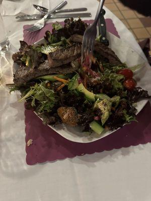 Full size steak salad with house dressing.