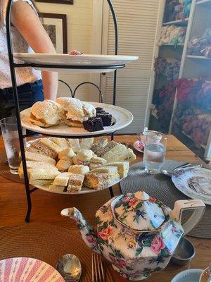 Scones, sandwiches, cookies, and tea