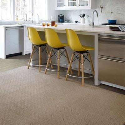 Colors come and go but one thing never changes, people want warm, inviting area rugs to soften their spaces.