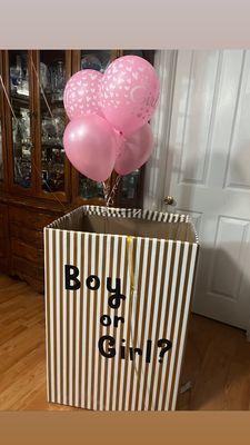 Self made box with perfectly placed balloons. We chose half weighted down like this & half flew up when opened. Beautiful reveal.