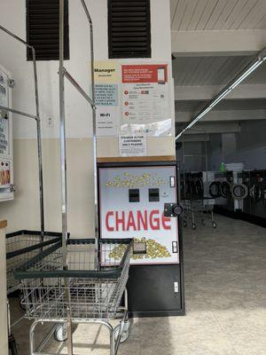 The change machine accepts $5 & $1 bills - I didn't try a $10 bill