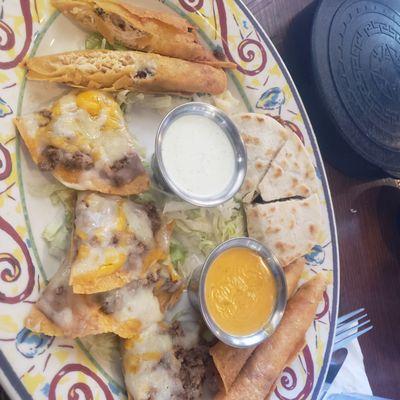 Sampler - Beef quesadillas, chicken flautas, & nachos.