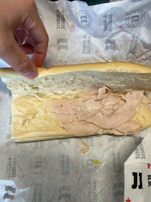 No meat on half of sandwich