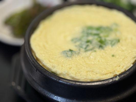 Steamed Egg * GYE-RAHN-JJIM | $10 | Battered egg, steamed with chopped green onions.